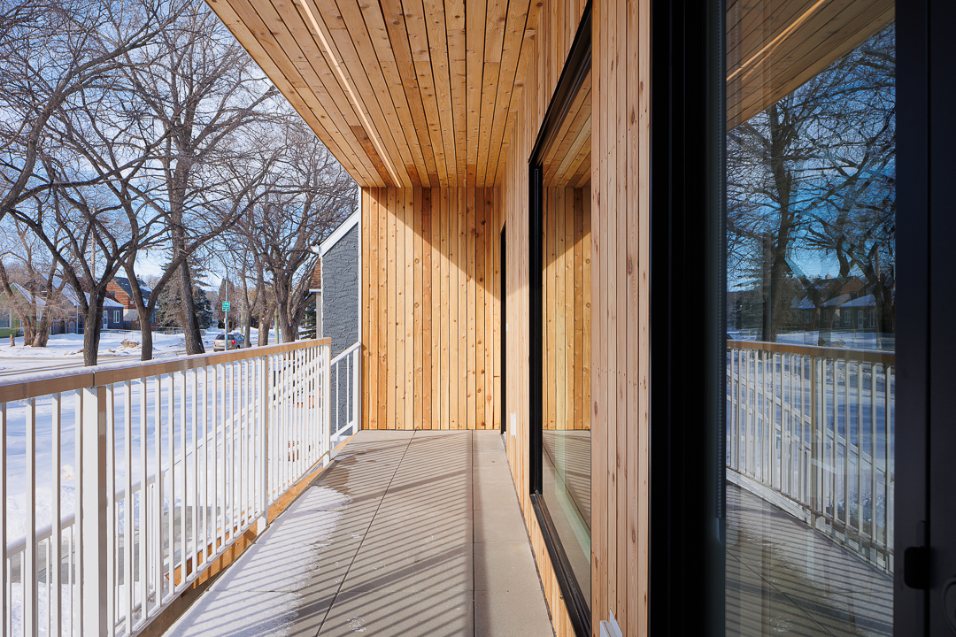 Private cedar balcony overlooking the street